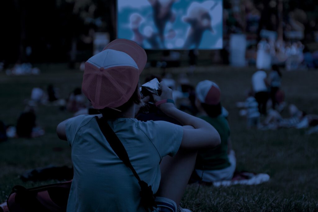 photo of outdoor movies in the backyard of the Acadia Inn
